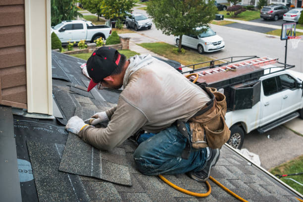 Professional Roofing technician working in Hunter, OK